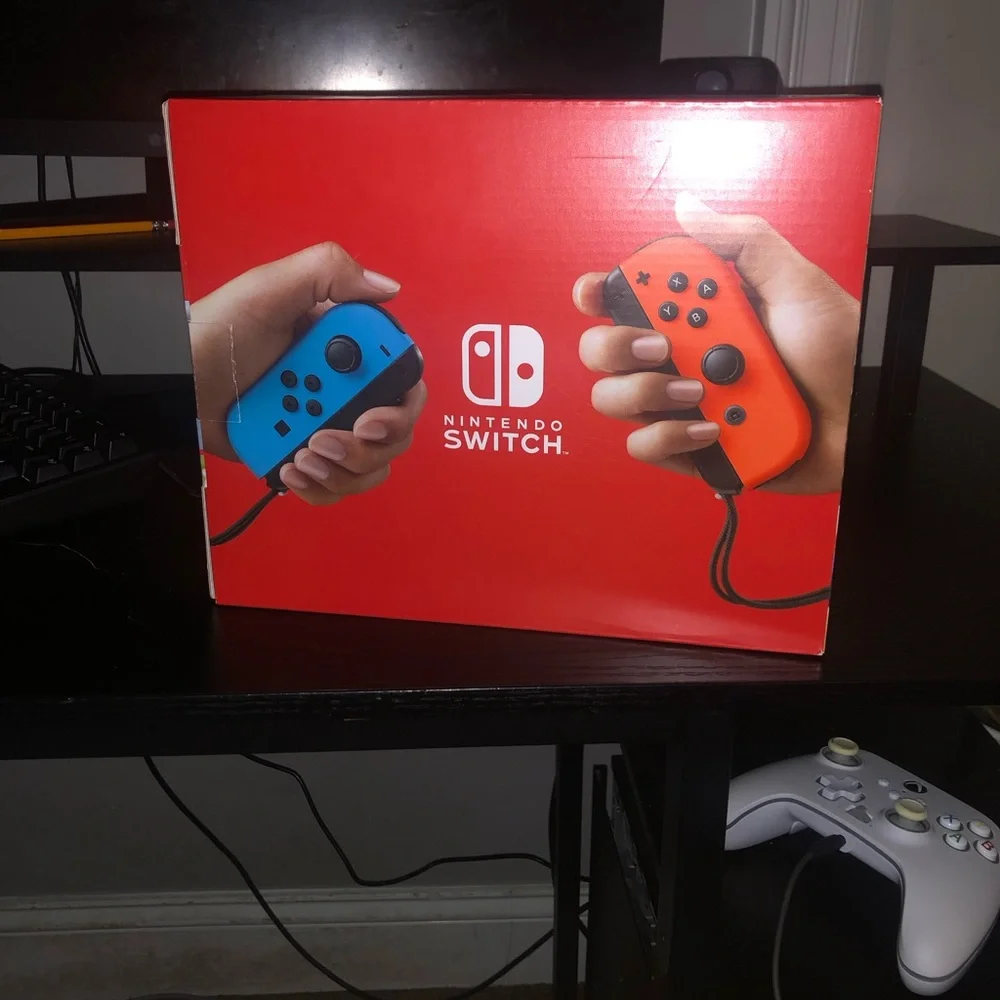 Nintendo Switch Console with Vibrant Blue and Orange Joy-Con